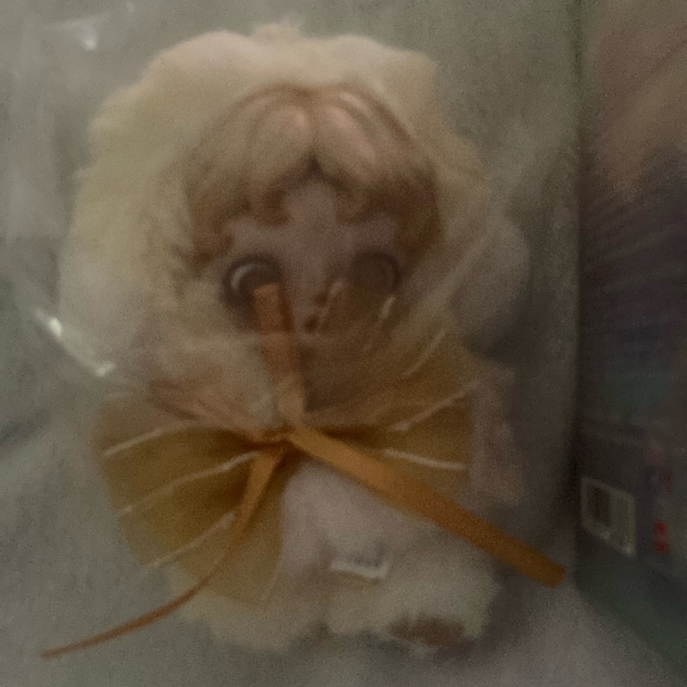 Adorable Plush Toy With Bow